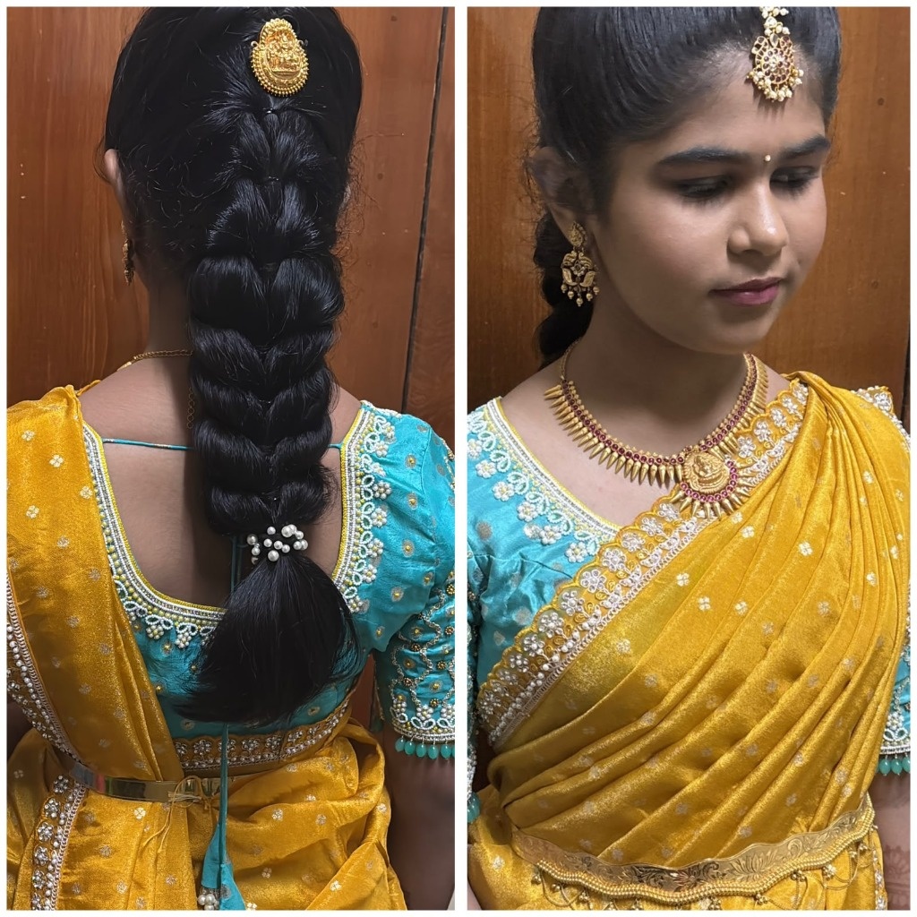 Traditional South Indian bridal braided hairstyle (Jada) with fresh jasmine flowers